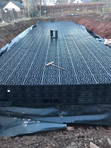 Installation of an attenuation tank step 3 Ecobloc maxx attenuation tank with a Ecobloc flex row