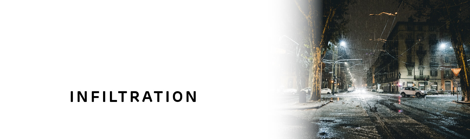 Header image with “Infiltration” in capital letters; with a photo of a dark, rainy street during a storm.